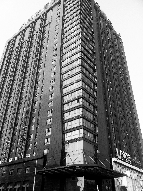 記者按照公開地址在鄭州一處寫字樓尋找一家軟件公司，一無所獲。