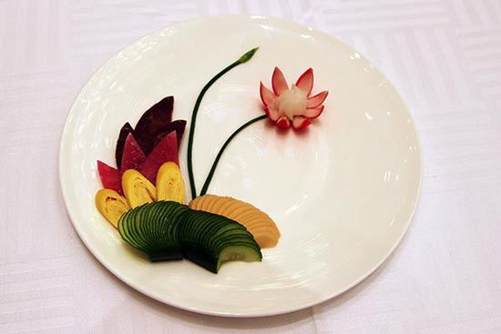 迎賓冷盤“洋花蘿卜”。 花惠生 供圖