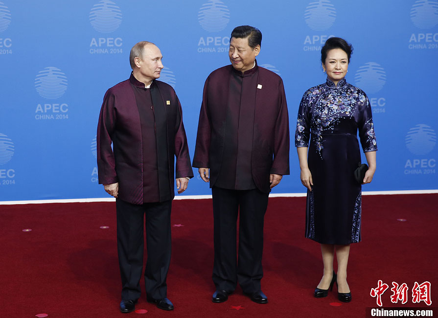 圖為習(xí)近平夫婦歡迎俄羅斯總統(tǒng)普京。中新社發(fā) 杜洋 攝