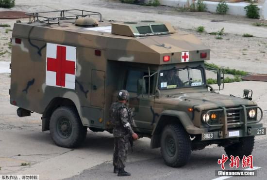 資料圖：當(dāng)?shù)貢r間2014年6月23日，韓國江原道哨所槍擊事件肇事士兵林某已被抓獲